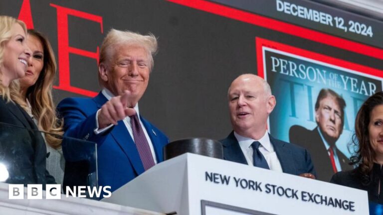 Trump rings bell on record stock market